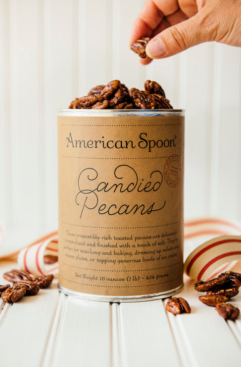 Load image into Gallery viewer, an open 16 oz canister of candied pecans