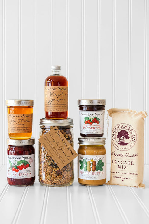 Load image into Gallery viewer, American Spoon products stacked together - Star Thistle Honey, Fruit Perfect Sour Cherries, Maple Granola, Maple Syrup, Early Glow Strawberry Preserves, Peanut Butter and Wheat & Malt Pancake Mix