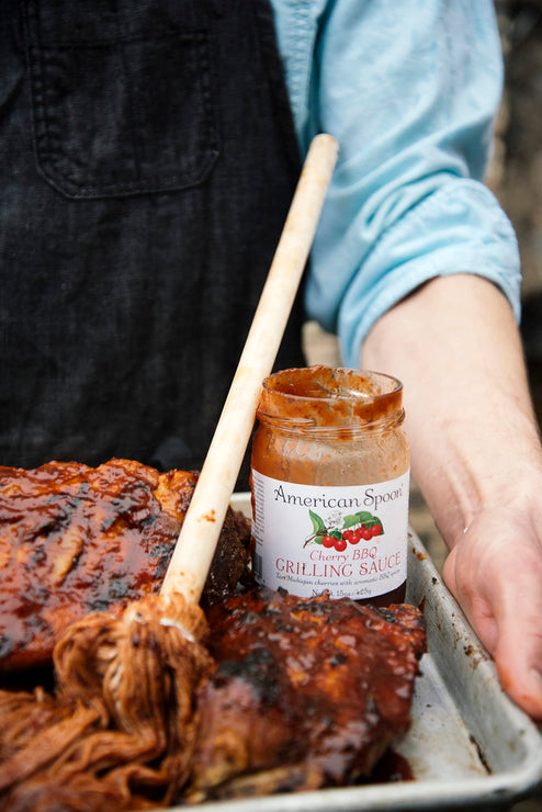 Load image into Gallery viewer, A rack of ribs made with Cherry BBQ Grilling Sauce