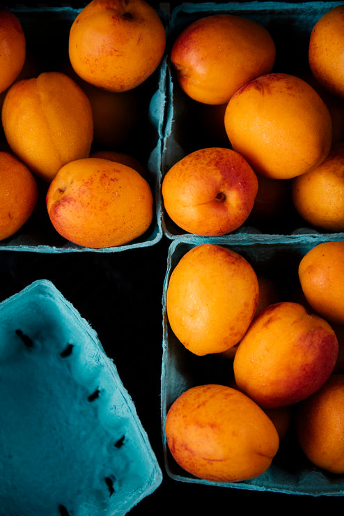 Load image into Gallery viewer, Pints of ripe apricots