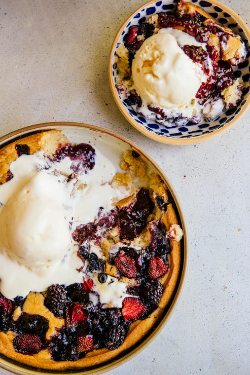 Load image into Gallery viewer, fresh berry cobbler topped with vanilla ice cream
