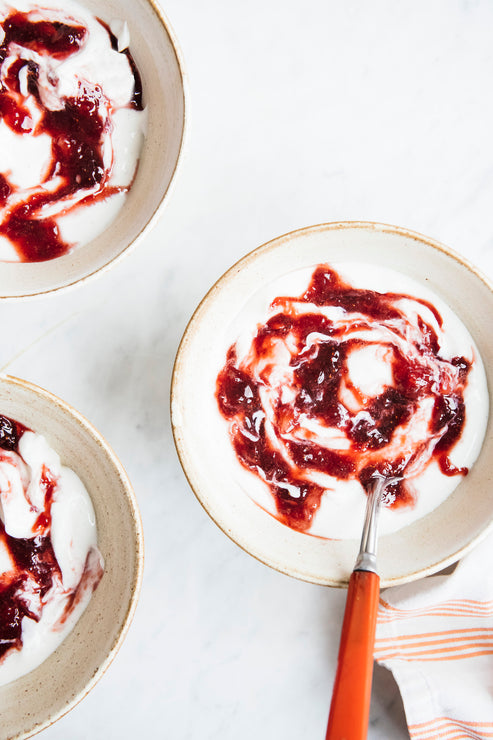Load image into Gallery viewer, Greek yogurt swirled with bright red strawberry preserves
