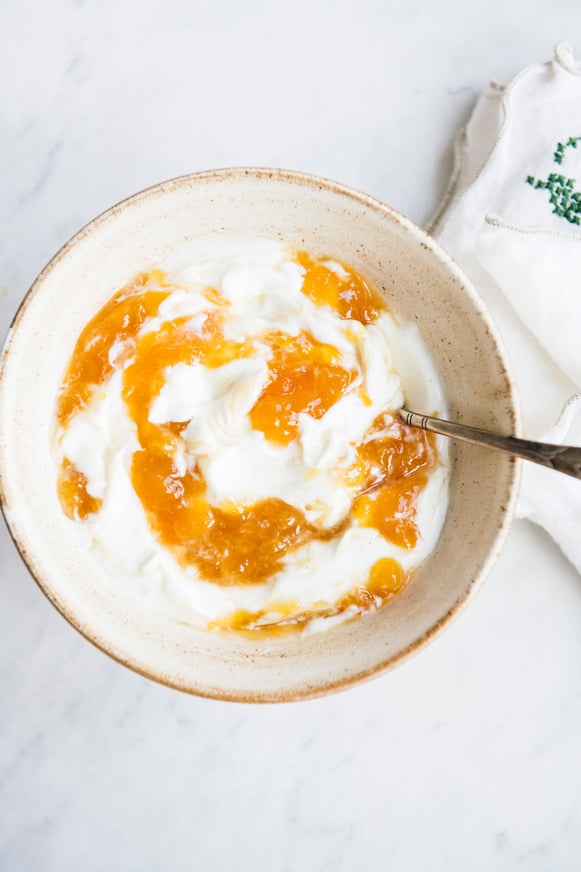 Bowl of yogurt topped with American Spoon preserves