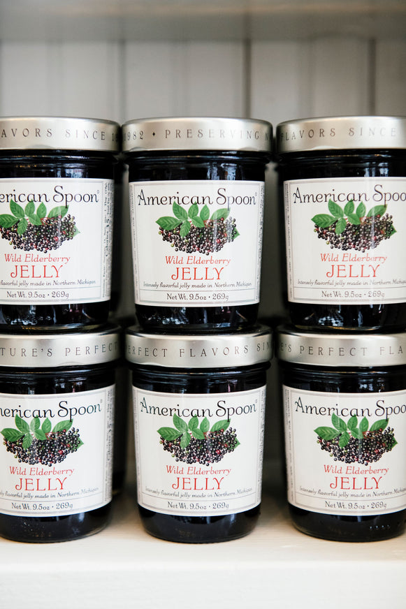 stacks of Wild Elderberry Jelly in store shelves