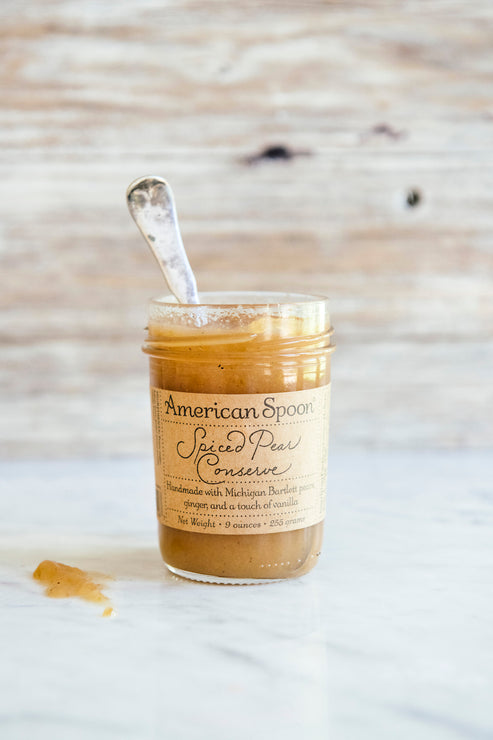 Load image into Gallery viewer, Jar of American Spoon Spiced Pear Conserve with a spoon on a wooden surface
