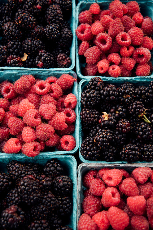 Load image into Gallery viewer, quarts of fresh red raspberries and blackberries
