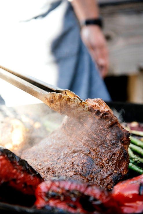 Load image into Gallery viewer, ribs and vegetables on the grill
