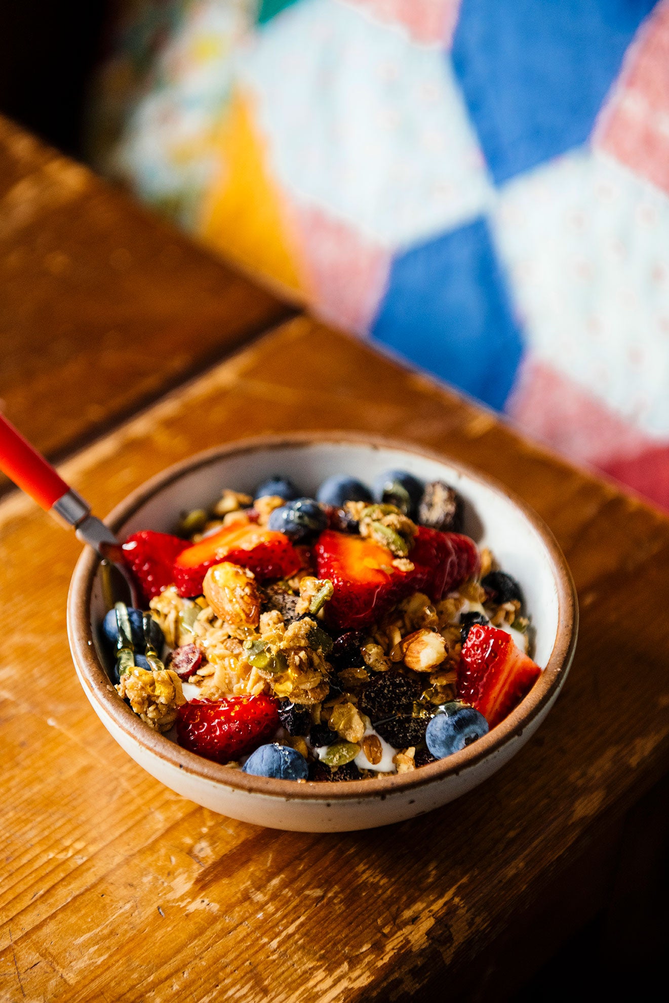 A collection of American Spoon bestsellers: Fruit Perfect Blueberries, Sour Cherry Preserves, Lemon Curd, Maple Granola, Red Raspberry Preserves, Red Haven Peach Preserves, Salted Maple Caramel, Early Glow Strawberry Preserves, Cherry-Peach Salsa, and Bloody Mary Mix