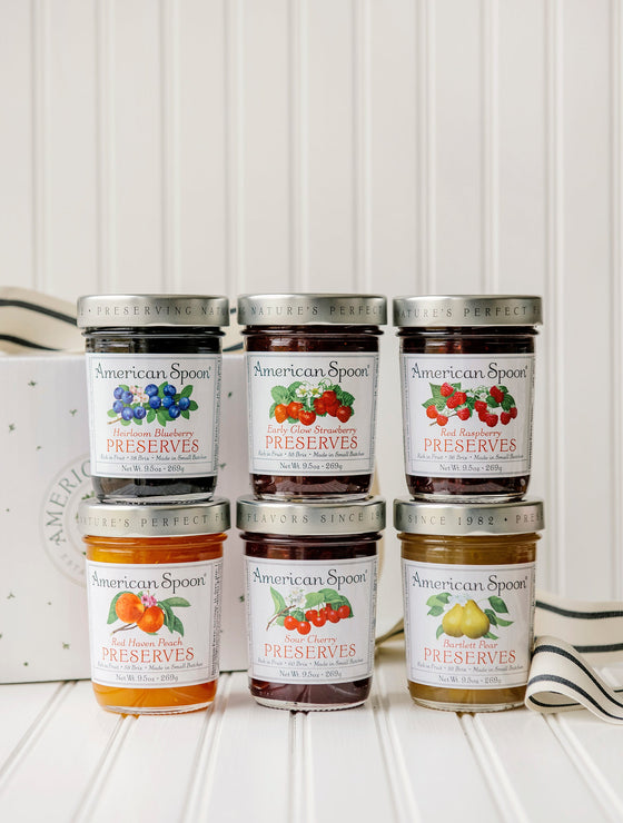 Load image into Gallery viewer, The Michigan Six Pack gift box containing Heirloom Blueberry Preserves, Early Glow Strawberry Preserves, Red Raspberry Preserves, Red Haven Peach Preserves, Sour Cherry Preserves and Bartlett Pear Preserves
