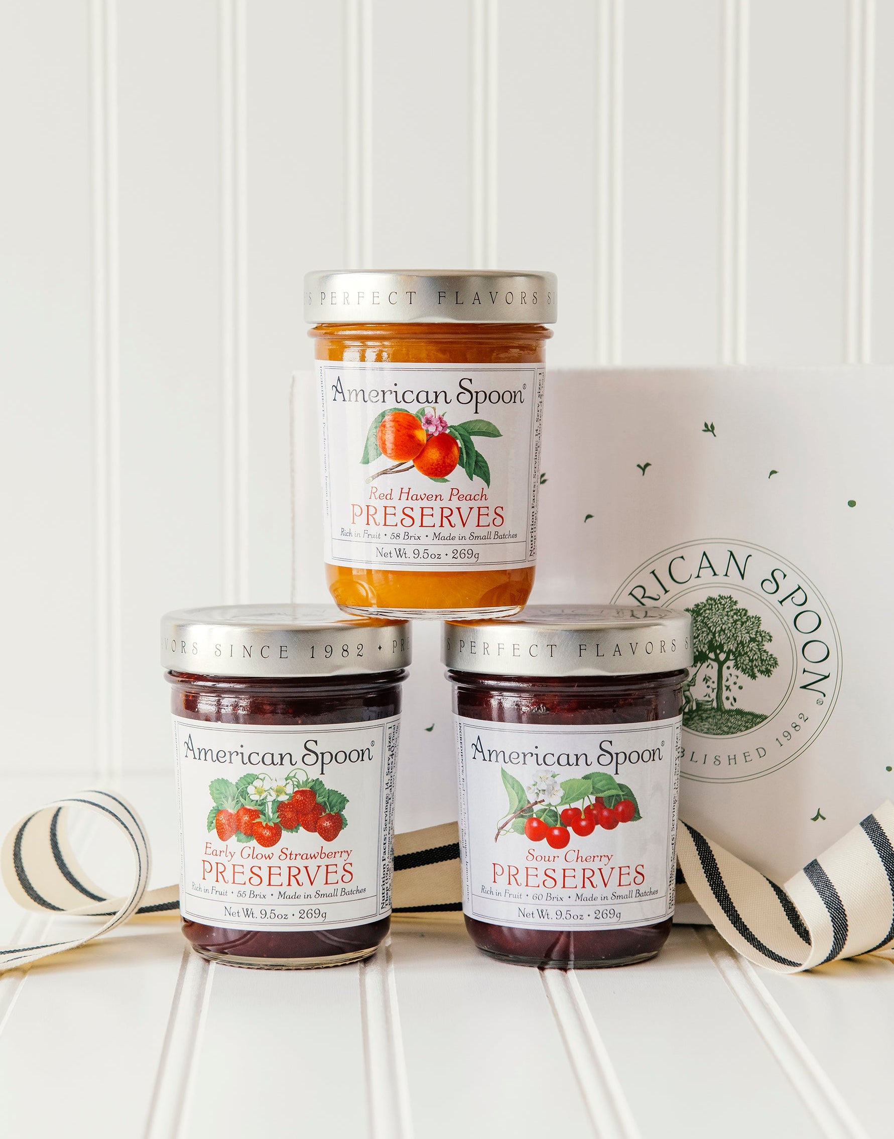 Favorite Preserve Trio gift box including early glow strawberry preserves, red haven peach preserves, sour cherry preserves