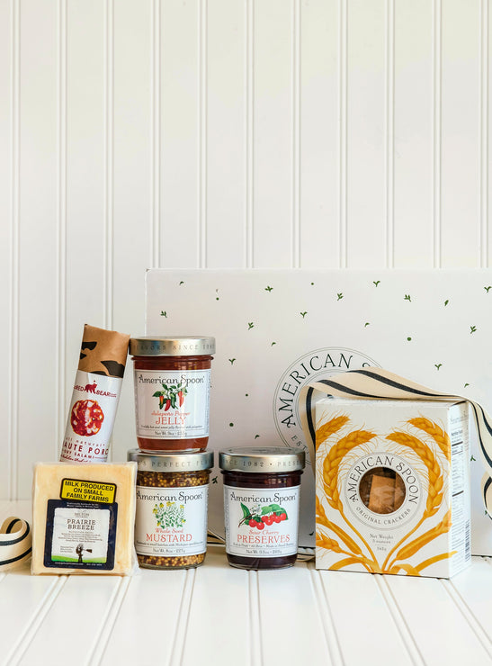 Load image into Gallery viewer, The Party Starter gift box including Haute Porc Salami, Prairie Breeze Cheese, Jalapeno Pepper Jelly, Whole Seed Mustard, Sour Cherry Preserves, American Spoon Original Crackers and a gift box
