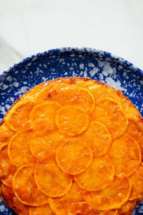 Load image into Gallery viewer, orange marmalade cake on a blue plate
