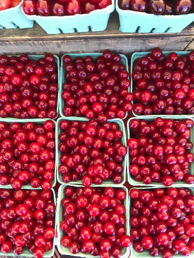 farm market baskets of fresh cherries