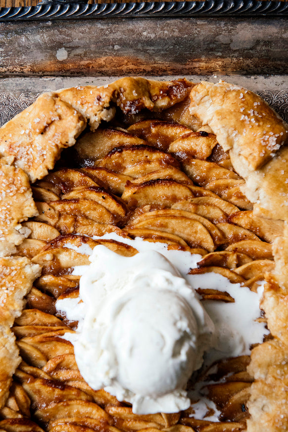 An apple galette with vanilla ice cream