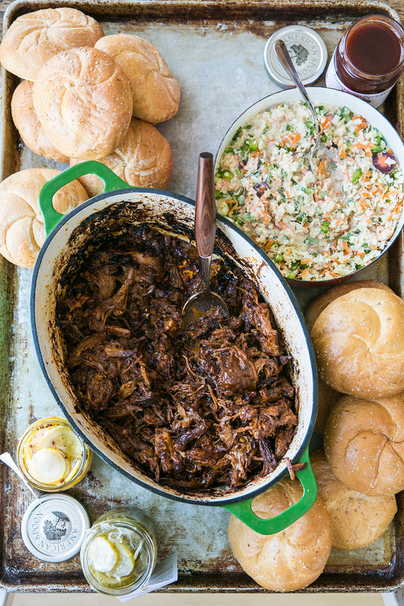 Pulled pork made with American Spoon Grilling Sauce, coleslaw and homemade pickles